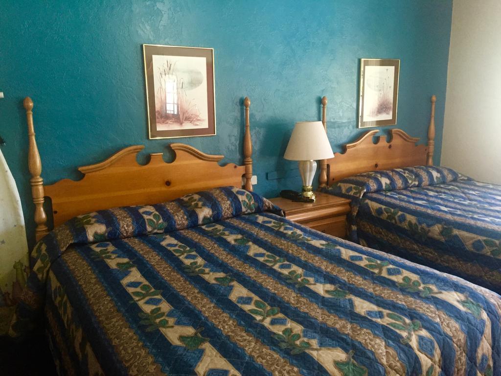 Paradise Inn Quarto foto