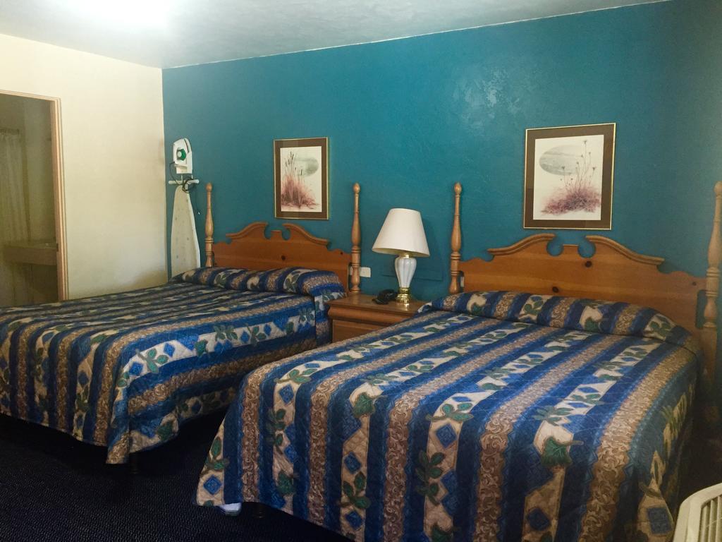 Paradise Inn Quarto foto